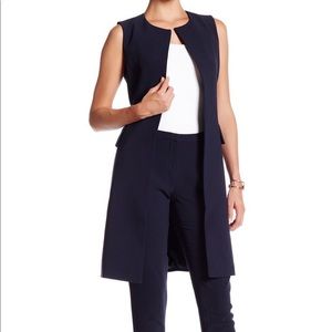 Ellen Tracy sleeveless jacket with a belt